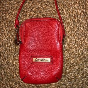 Orange leather Calvin Klein pouch